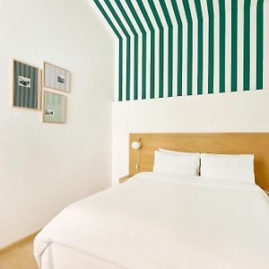 Kamer met een Queen Size Bed
